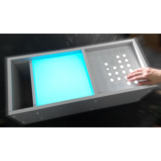 Интерактивный стол «Малыш», совмещенный со столом для рисования песком и с кармашком для песка.